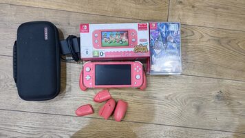 Nintendo Switch Lite 32GB su 7 žaidimais, dėklu ir SD kortele.