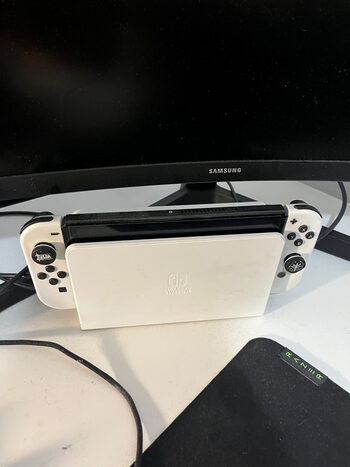 Switch oled + 2 pro controllers + funda