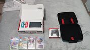 Nintendo Switch + Mando Pro + 4 Juegos + Accesorios.