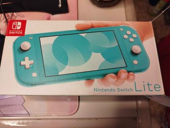 NINTENDO SWITCH LITE + JUEGOS  for sale