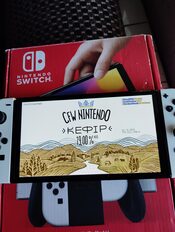 Redeem NINTENDO SWITCH OLED CON H@CK + 256GB SD COMPLETA