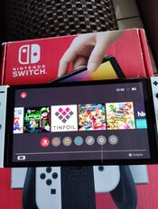 Get NINTENDO SWITCH OLED CON H@CK + 256GB SD COMPLETA