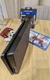 Get PlayStation 4 Slim trys pultai + 2 žaidimai