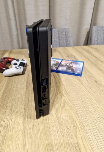 Redeem PlayStation 4 Slim trys pultai + 2 žaidimai