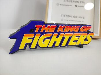 Letrero juego The King of fighters en 3D