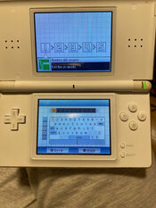 Nintendo Ds lite con dos juegos.