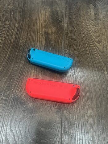 Nintendo Switch Joycon'ai/Raudonas/Melinas for sale