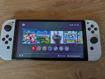 Buy Nintendo Switch OLED + 5 games