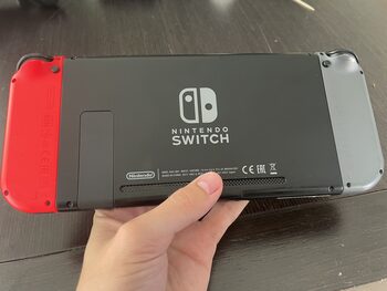 Nintendo Switch, roja y gris, 26GB,con plataforma y cargador for sale