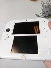 Nintendo 2ds blanco y roja con cargador original 