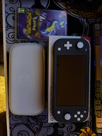 NINTENDO SWITCH LITE + POK. PURPURA + FUNDA