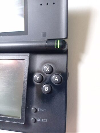 Nintendo ds lite negra con cargador y lápiz solamente 