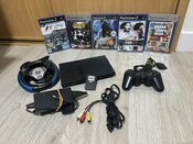 PlayStation 2 Slimline + mando + cableado + memory card 16mb + juegos