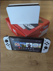 Nintendo Switch OLED + 5 games