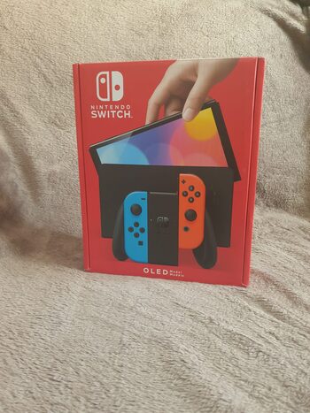 NINTENDO SWITCH OLED NUEVA A ESTRENAR AZUL Y ROJO, PRECINTADA