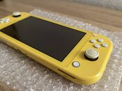 Get Nintendo Switch Lite, Yellow, 256GB su dėklu bei žaidimu