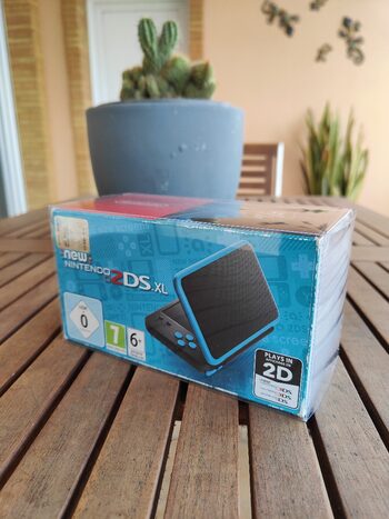 New Nintendo 2ds xl + Caja