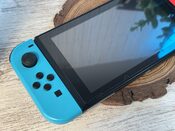 Redeem Nintendo Switch excelente estado y protector de pantalla