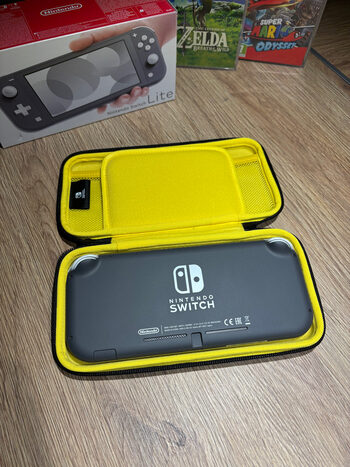 Nintendo Switch Lite + dėklas + 2 žaidimai for sale