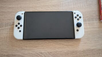 Nintendo Switch Oled + MarioKart 8 Deluxe + Funda