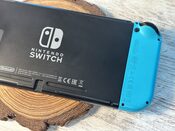 Nintendo Switch excelente estado y protector de pantalla