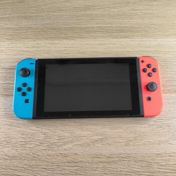 Consola Nintendo Switch con Joy Con Neon Rojo Azul