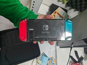 Nintedo switch + 12 juegos + mando  for sale