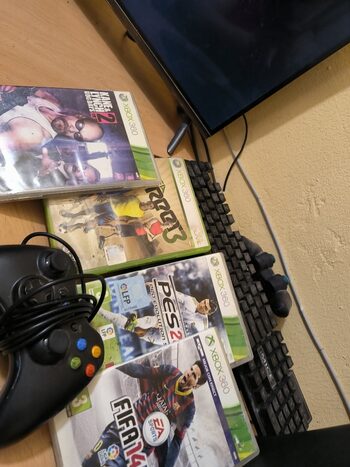 vendo consola xbox 360 con 4 juegos 