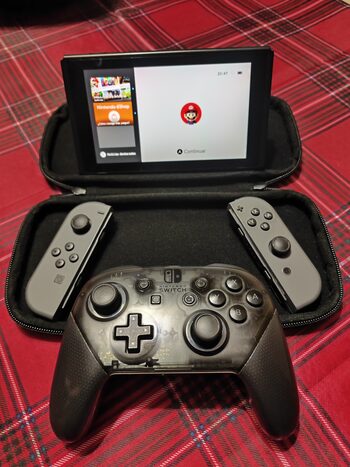 Nintendo Switch (v1 2017 moddable) + Mando Pro + Funda oficial