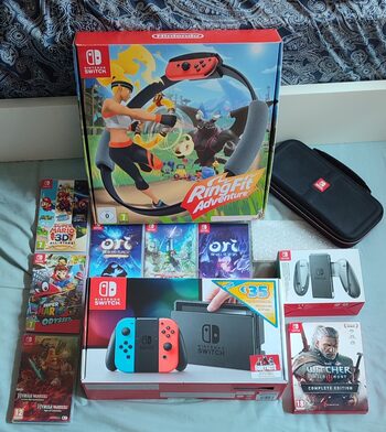 pack Nintendo switch + 8 juegos + extras