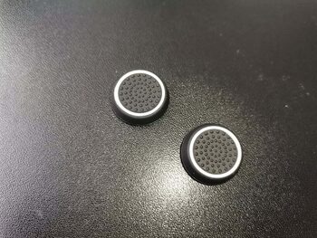 2x Pultelio analogų papildomos apsauginės gumos / caps'ai / stick'ų apsauga