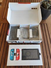 Redeem Nintendo Switch V2 (Rojo y Azul) + Extras