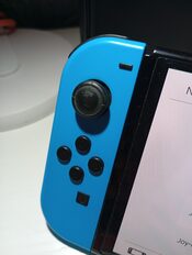 Redeem Nintendo Switch OLED Rojo/Azul