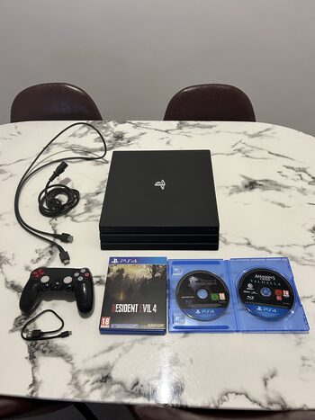 PS4 pro 1tb con mando y juegos 