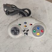 Mando SNES con modos turbo y auto 