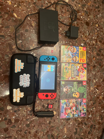 nintendo switch + juegos + tarjeta sd 128