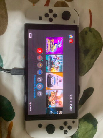 Nintendo switch OLED con pack de la saga bioshock completa de regalo y todos los accesorios 