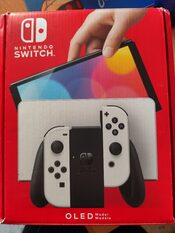 Nintendo Switch OLED + Extras for sale