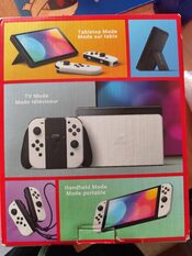 Redeem Nintendo Switch OLED + Extras