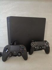 PS4 atrištas PlayStation 4, Black, 1TB Hen 11.00 du pultai, su žaidimais su FC25