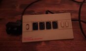 Nintendo NES 4 pultelių/controller adapter