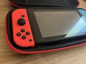 Nintendo Switch, Blue & Red, 32GB su Mario žaidimu