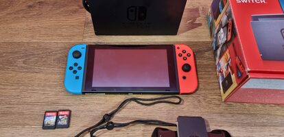 Nintendo switch su daug priedų ir garantija