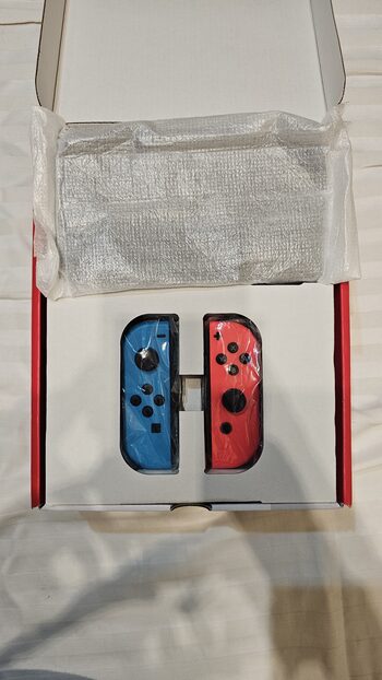 Get Nintendo Switch OLED, Blue & Red, 64GB