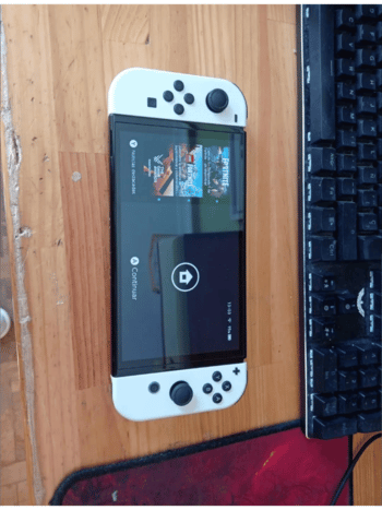 Nintendo Switch OLED, White, 64GB con 2 juegos