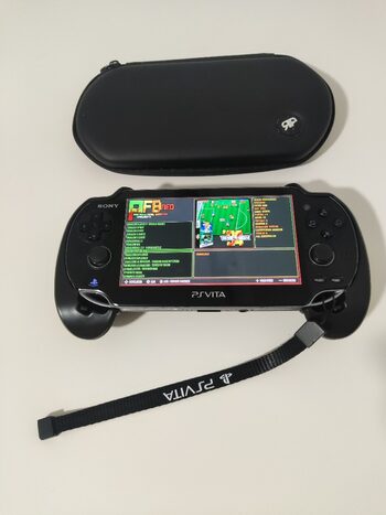 PSVITA CON ACCESORIOS. INCLUYE CABLE DE CARGA FUNDA Y SOPORTE PARA JUGAR SD 128GB. 