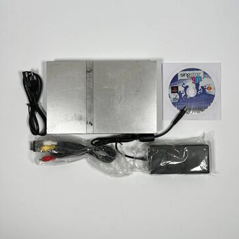 PlayStation 2 Slimline, Silver + Cables and a Game