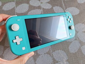 Nintendo switch lite + extras for sale