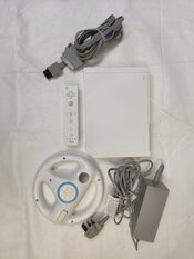 Nintendo Wii + Wii Wheel + Controller + AV Cable + Power supply