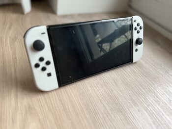 Nintendo Switch OLED, atrištas,daug priedų